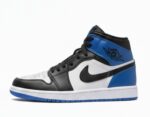 Nike Air Jordan 1 Mid sneakers in a White, Black, and Game Royal colorway.