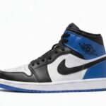Nike Air Jordan 1 Mid sneakers in a White, Black, and Game Royal colorway.