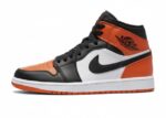 Nike Air Jordan 1 Mid in the Starfish/White/Black colorway