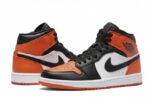 Nike Air Jordan 1 Mid in the Starfish/White/Black colorway - Image 4