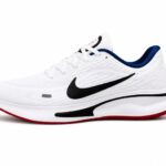 Nike Journey Run Men's Road Running Shoes in a white, black, and fire red colorway