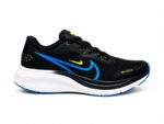 Nike Air Alpha Zoom Runner shoes featuring a white sole and blue accents. - Image 4