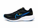 Nike Air Alpha Zoom Runner shoes featuring a white sole and blue accents.