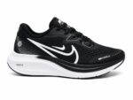Nike Air Alpha Zoom Runner shoes in black and white. - Image 4
