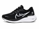 Nike Air Alpha Zoom Runner shoes in black and white.