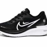 Nike Air Alpha Zoom Runner shoes in black and white.